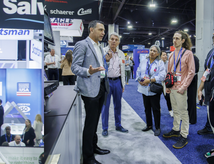 Exhibitor speaks to small crowd gathered in booth